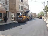 اجرای عملیات تعریض ، جدول گزاری و آسفالت خیابان ابوذر روستای قمصر