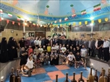تجلیل از خانواده های معظم شهدای جنگ رمضان بخش خاوران در جمع باستانی کاران شهر قیامدشت